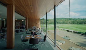 A beautiful view from the dining room and event space overlooking the rolling hills and golf course below