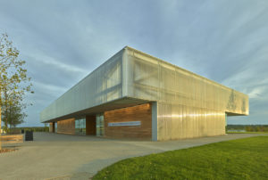 Opposite side of the center with metal and wooden accents facing the park walkways