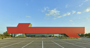 Harvey Pediatric Clinic video thumbnail of red metal building profile on blue sky