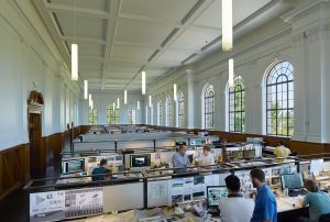 Historic Vol Walker hall featuring students on computers working on various architectural projects