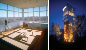 Keenan Tower House interior with a view of the woods and exterior lit up at night