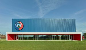 The blue and red structure featuring a large "O-Gag-Pah" paired with a bison logo on the exterior
