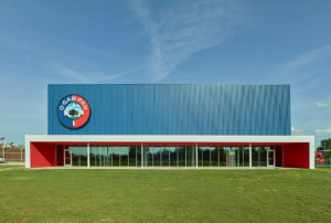 The blue and red structure featuring a large "O-Gag-Pah" paired with a bison logo on the exterior
