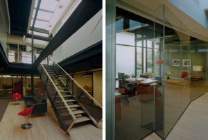 Beautiful wood, glass, and steel beams make up the interior which is lit by skylight above