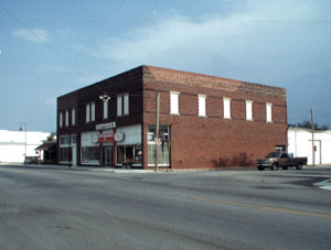 A Gentry Public Library historic photo of an old brick rectangular building