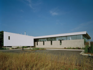 A view of the building's 'slipped enty' for people to enter from the parking lot