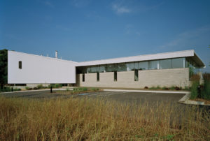 A view of the building's 'slipped enty' for people to enter from the parking lot