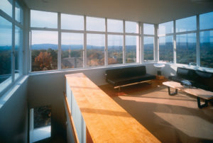 The modern interior of the Keenan TowerHouse shows a view of the sprawling woods