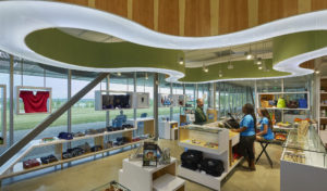 Shelby Farms Park visitor center interior photo of a man shopping for gifts