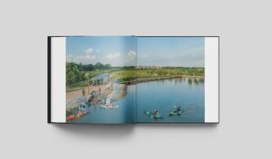 Radical Practice book interior spread of an outdoor park along the lake with kayakers and a small crowd enjoying the park